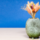 vase with bouquet of dried flowers on table - PhotoDune Item for Sale