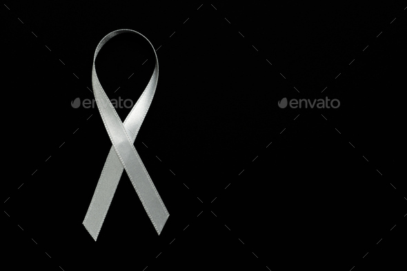 white ribbon on black background symbol of peace and protest against violence against women