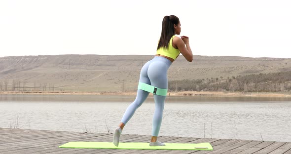 Attractive fit black woman. Workout outdoors. Healthy lifestyle.