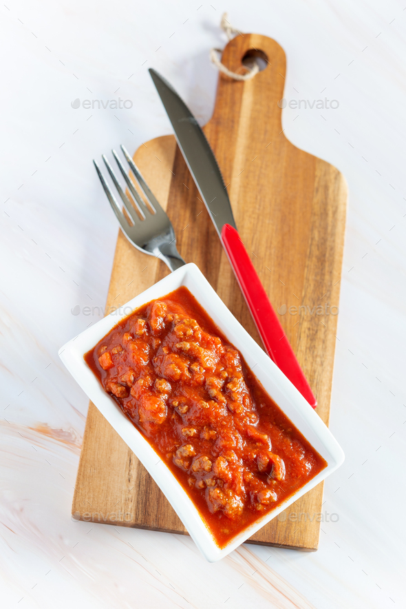 white bowl with minced meat ragout - Stock Photo - Images