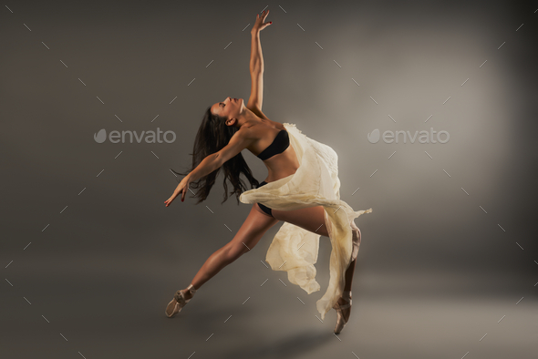 Woman dancing on a playground - a Royalty Free Stock Photo from Photocase