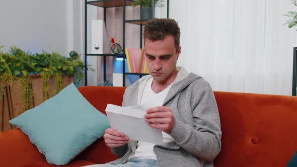 Man Open Envelope Letter Reads It Feel Happy Career Growth Advance Promotion Bank Loan Approve alt