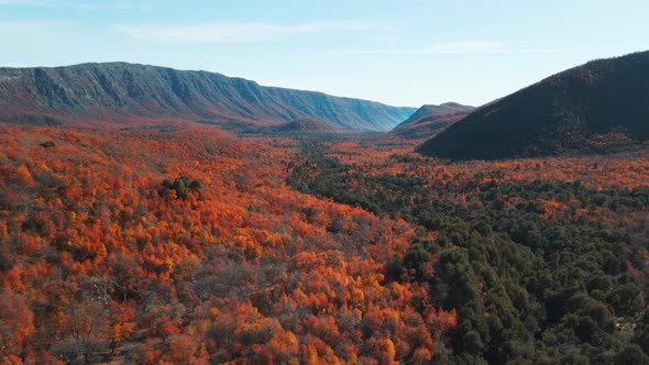 Aerial view of Radal 7 Tazas national park landscape with mountains and blue sky at daytime alt