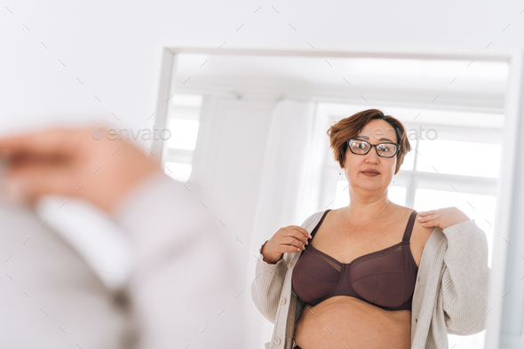 Mid section of woman wearing oversized panty - Stock Photo