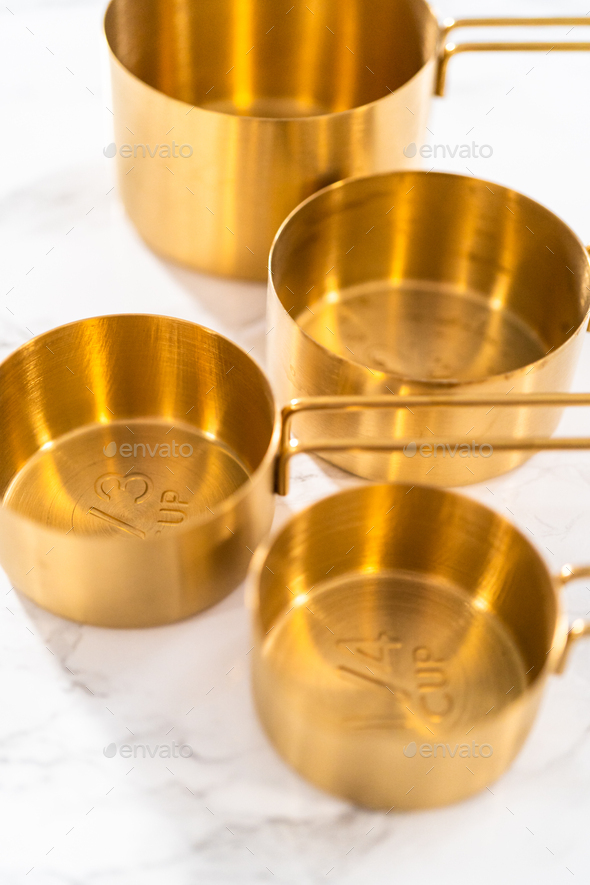 Measuring cups and spoons Stock Photo by arina-habich