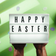 Happy easter signboard on green background - PhotoDune Item for Sale