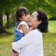 Adorable asian granddaughter is playing and kissing together with grandmother - PhotoDune Item for Sale