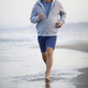 Active senior man jogging along the beach - PhotoDune Item for Sale