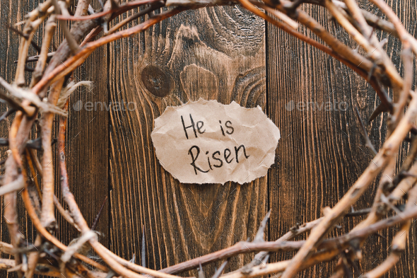 He is Risen. Jesus Crown Thorns and nails and cross on a wood background. Easter Day