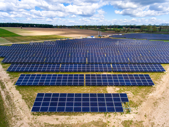 Land covered in solar cell panels Stock Photo by wirestock | PhotoDune