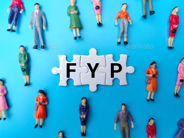 Miniature people with the word FYP on blue background. - Stock Photo - Images