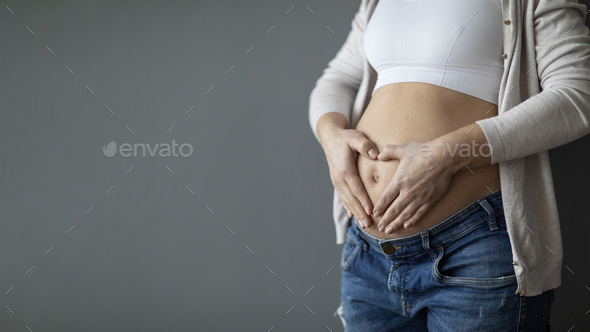 Womans Hands Shaped To Hold Copy Space Between Them Stock Photo