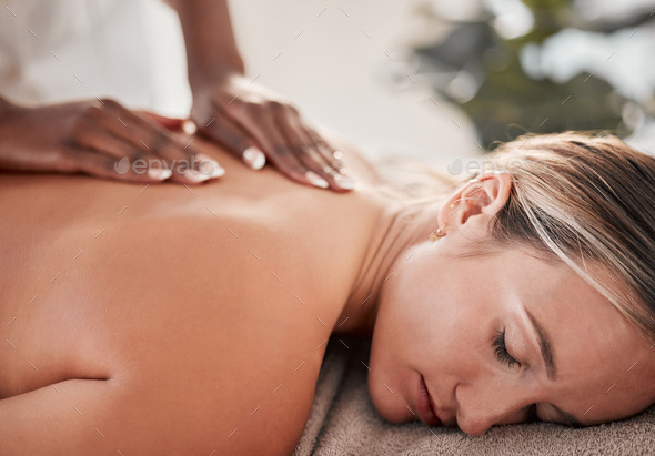 Hands, back massage with masseuse, woman at holistic center or spa with wellness, physical therapy