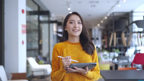 smart confidence asian female startup entrepreneur small business owner businesswoman