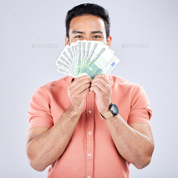 Asian man, portrait or money fan on studio background for financial freedom, stock market profit or