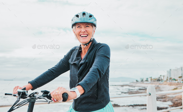 Laughing woman, helmet or electrical bike by sea in transport, clean energy fitness or sustainabili