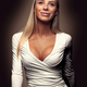 Beautiful fashion portrait of a smiling blonde woman in white dress - PhotoDune Item for Sale