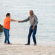 Senior couple dancing at the beach - PhotoDune Item for Sale