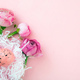 Easter eggs nest and Buttercups flower bouquet on pastel pink background, copy space. - PhotoDune Item for Sale