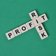 Square letters with text PROFIT and RISK. Top view. - PhotoDune Item for Sale