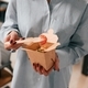 Woman in formal clothes is standing in the office with food that is in the eco box. With fork - PhotoDune Item for Sale
