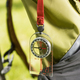 close-up view of compass hanging on backpack - PhotoDune Item for Sale
