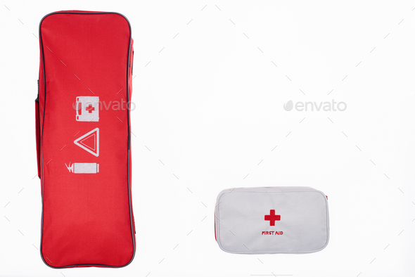 flat lay with automotive handbag and first aid kit isolated on white