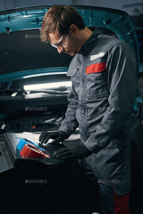 Mechanic conduct full technical inspection of air conditioner Stock