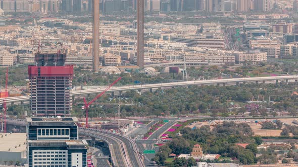 Aerial View to Financial and Zabeel District Timelapse with Traffic and Under Construction Building alt