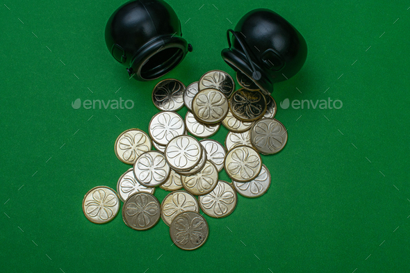Black pots with golden coins - Stock Photo - Images