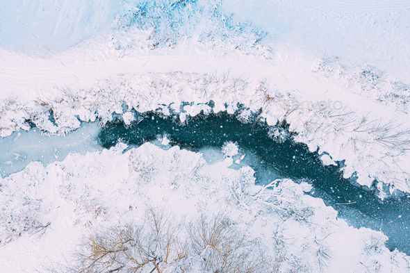 Amazing Aerial View On Freezing River. Aerial View Flight Above Frozen Creek. Scenic View Of Nature - Stock Photo - Images