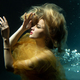 Beautiful girl in a dress underwater in a photo studio. - PhotoDune Item for Sale