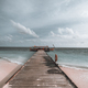 Vertical shot of a long wooden pier - PhotoDune Item for Sale
