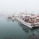 Fishing vessel in a foggy misty morning - PhotoDune Item for Sale