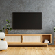 TV and wooden cabinet with gray armchair in modern living room the concrete wall - PhotoDune Item for Sale