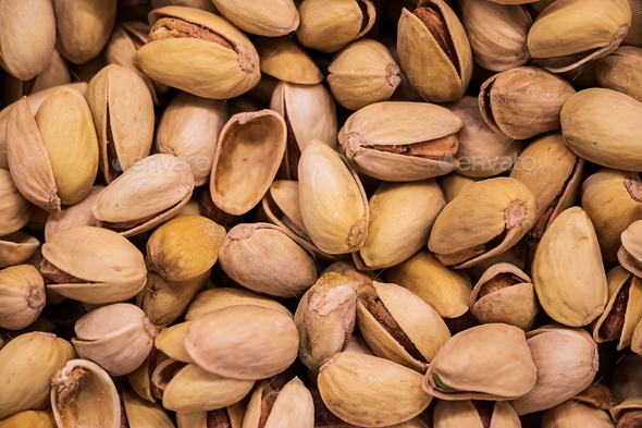 Background of fried pistachios. Nuts for a diet. - Stock Photo - Images