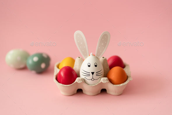 Easter eggs and cute bunny - Stock Photo - Images