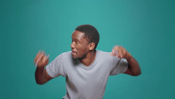 Silly Goofy Man Fooling Around and Sticking Tongue Out alt