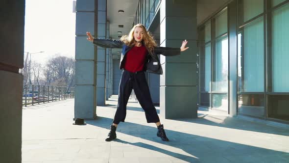 Contemporary Dance By Blonde Woman on Sunlit Street in Slow Motion alt