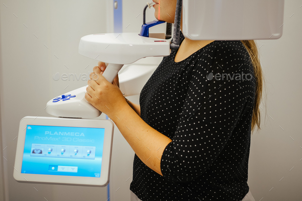 Closeup shot of a dental patient using panoramic radiography equipment