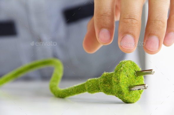 Green electric plug - Stock Photo - Images