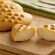 Traditional polish smoked cheese, mini “Gołka” Zakopianska, on a cutting board - PhotoDune Item for Sale