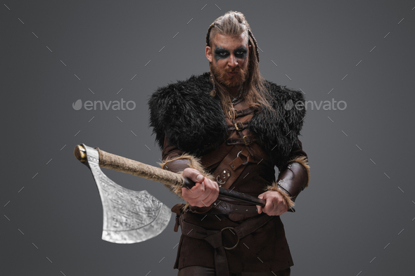 Evil viking from past with huge axe against grey background Stock Photo ...