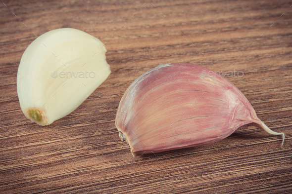 Healthy garlic containing vitamins and minerals. Alternative medicine - Stock Photo - Images