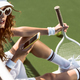 side view of beautiful stylish tennis player with smartphone resting on tennis court - PhotoDune Item for Sale