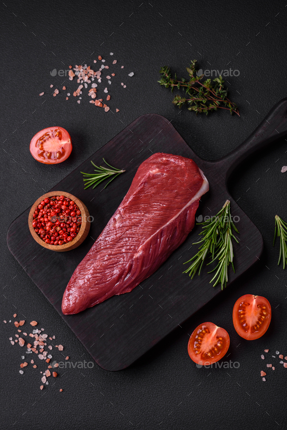 Fresh, raw meat on a cutting board, Stock image