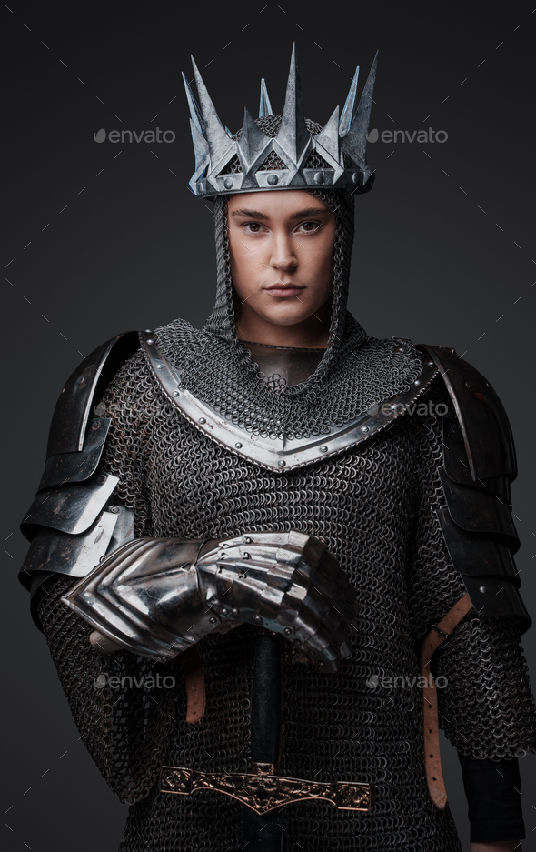 Knight queen from past with sword and armor Stock Photo by fxquadro