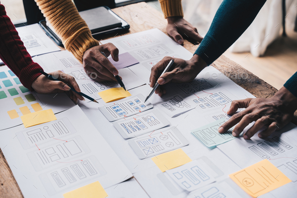 Young Asian business creative team work together, mobile application software design project. Brains - Stock Photo - Images