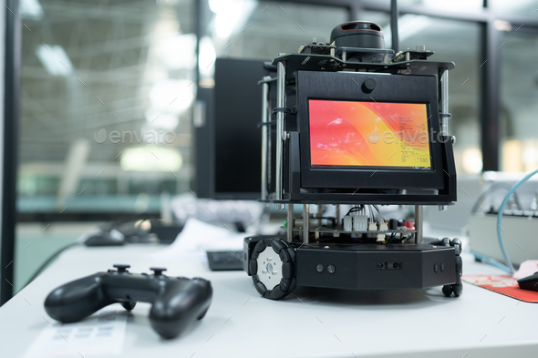 Small robot for operating the operation of the hand robotic technology. - Stock Photo - Images