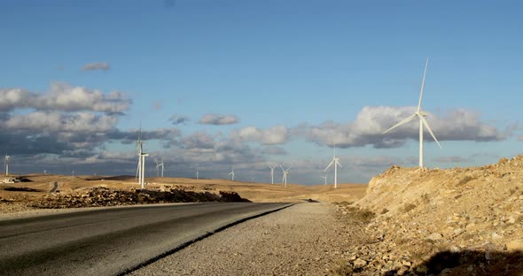 Landscape with road and wind turbines, Kings Highway, Jordan